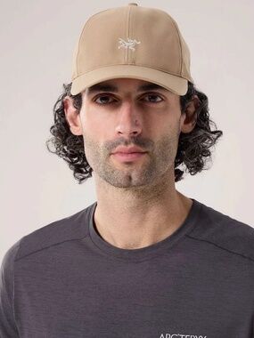 Beige Cap with White Embroidered Skeleton Logo